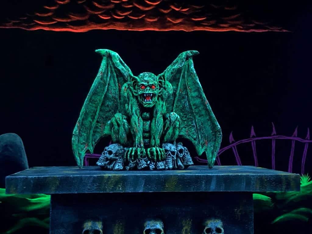 A spooky decoration of a gargoyle at Monster Mini Golf. 