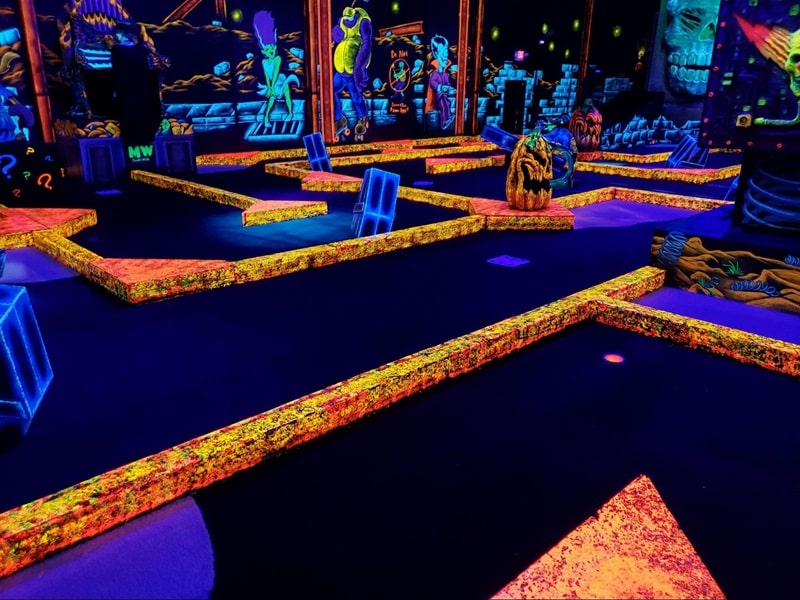 A glow-in-the-dark golf course at Monster Mini Golf. 