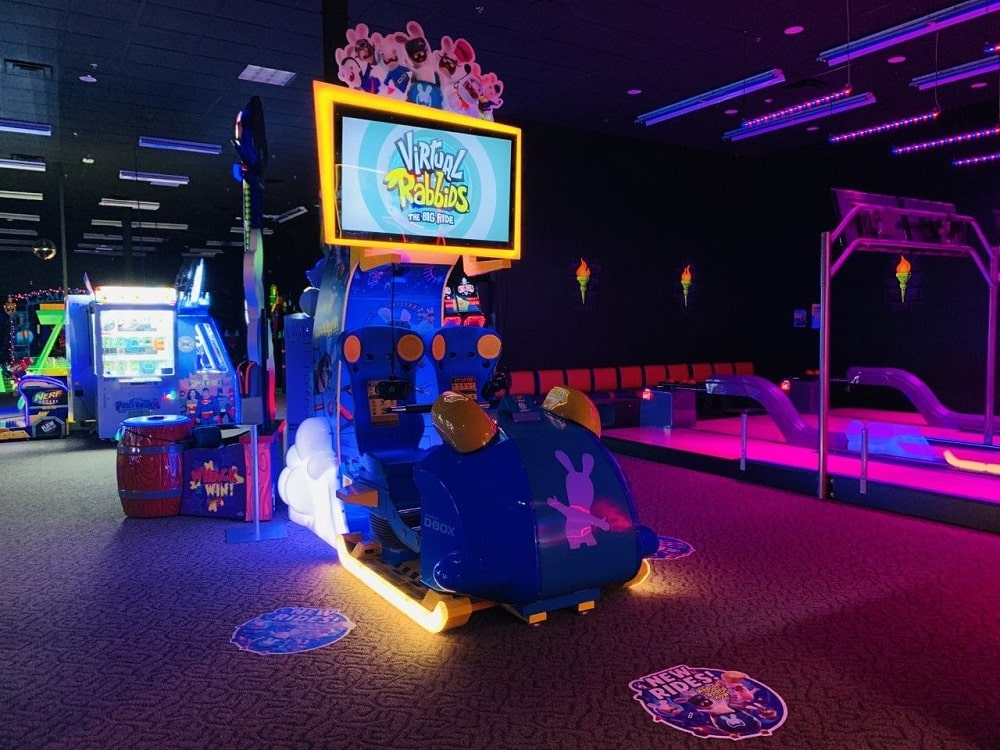 Virtual Rabbids game inside Monster Mini Golf arcade.