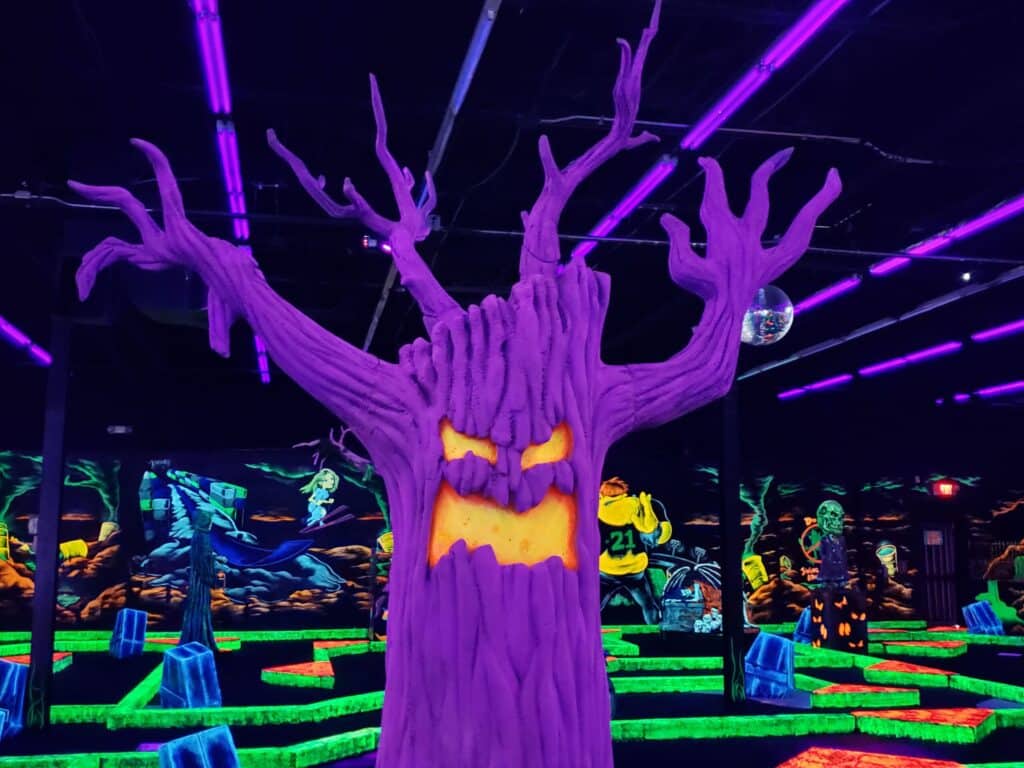 glowing scary tree at monster mini golf