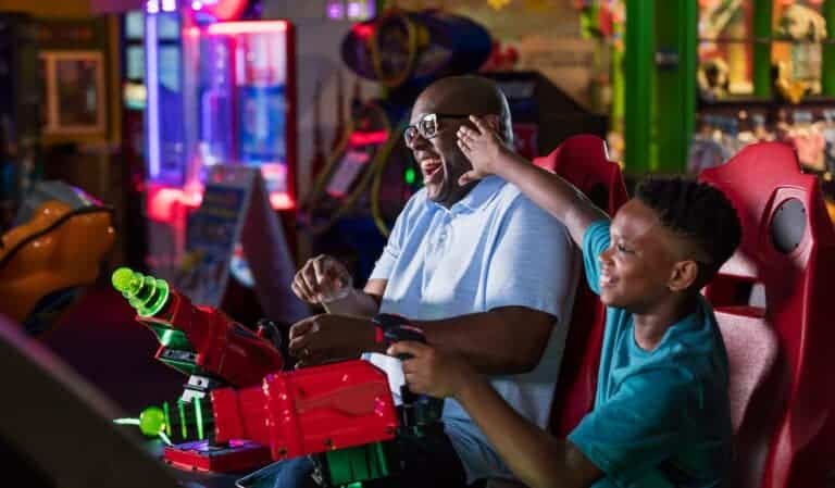 Father and Son playing at the Arcade