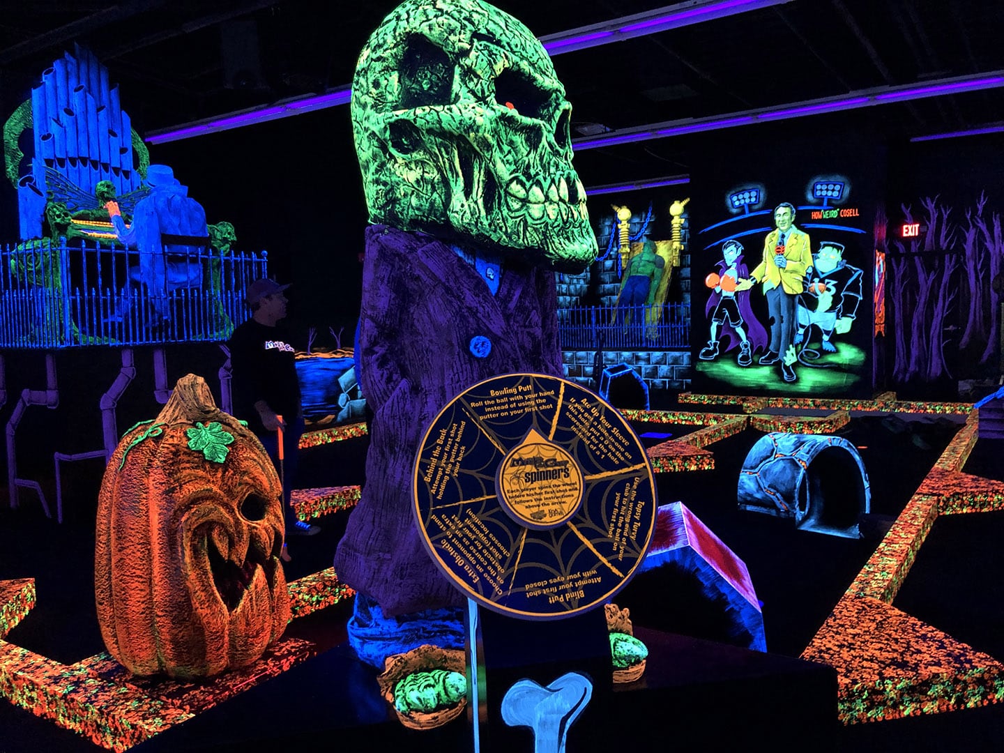 A glow-in-the-dark mini golf course at a Monster Mini Golf location.