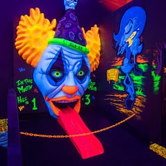 glowing clown head at monster mini golf course