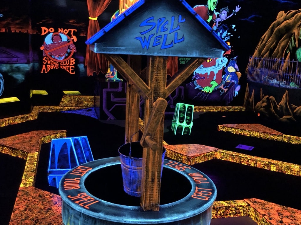 glowing water well at monster mini golf