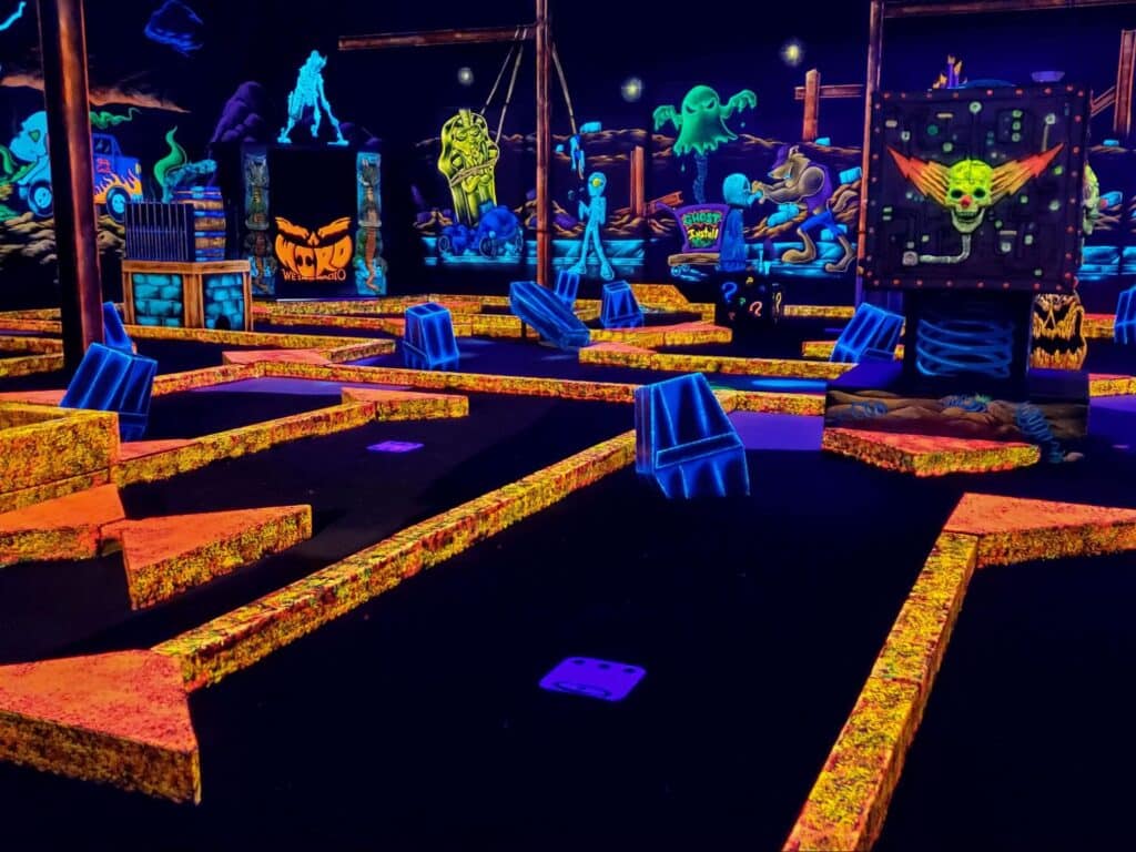 A glow-in-the-dark indoor mini golf course at Monster Mini Golf. 