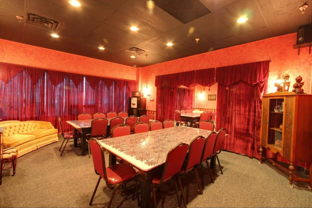 A private Haunted Mansion event room at Monster Mini Golf.