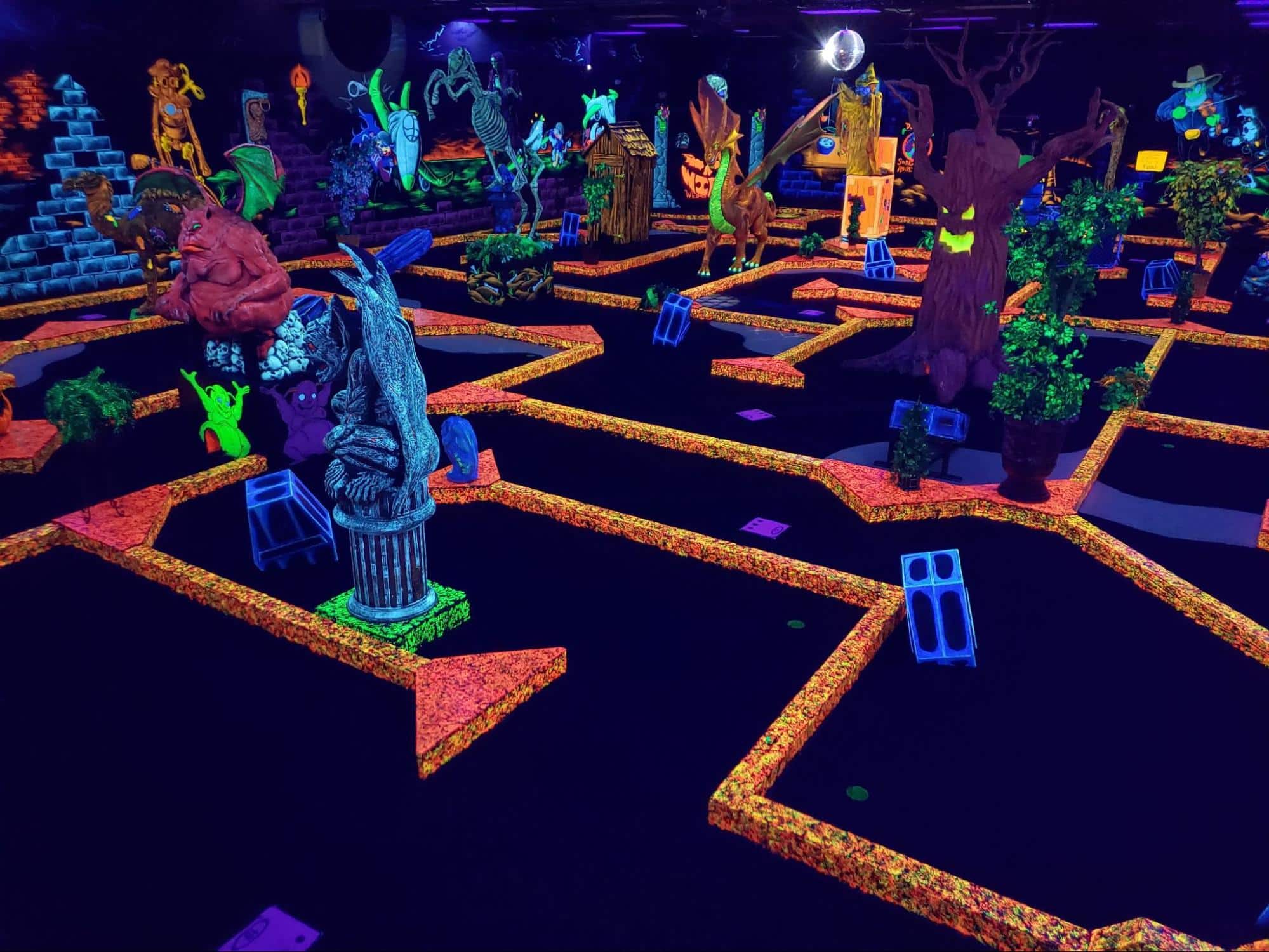 A glow-in-the-dark indoor mini golf course at Monster Mini Golf. 