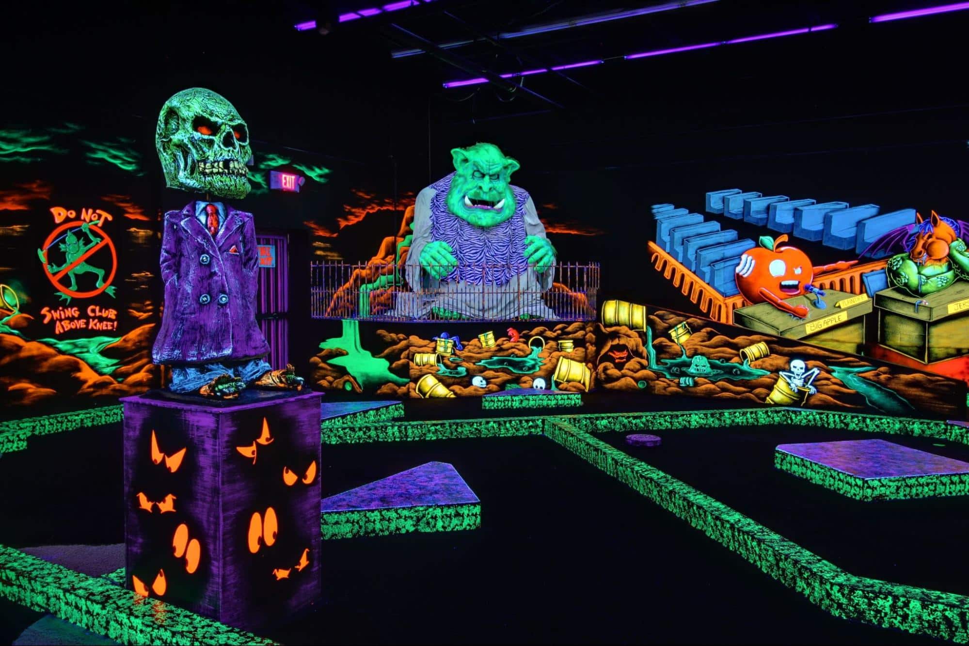 A glow-in-the-dark indoor golf course at Monster Mini Golf. 