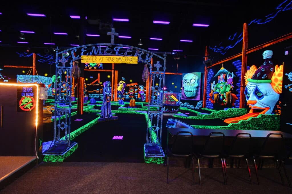 The entrance to a Monster Mini Golf indoor golf course.