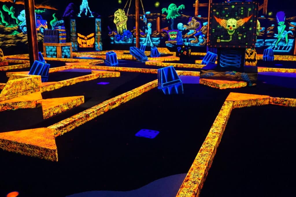 Grimes, Ia 6 A glow-in-the-dark indoor mini golf course at a monster mini golf location.
