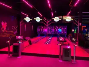 Mountlake Terrace 21 Neon-lit bowling alley with vibrant colors.