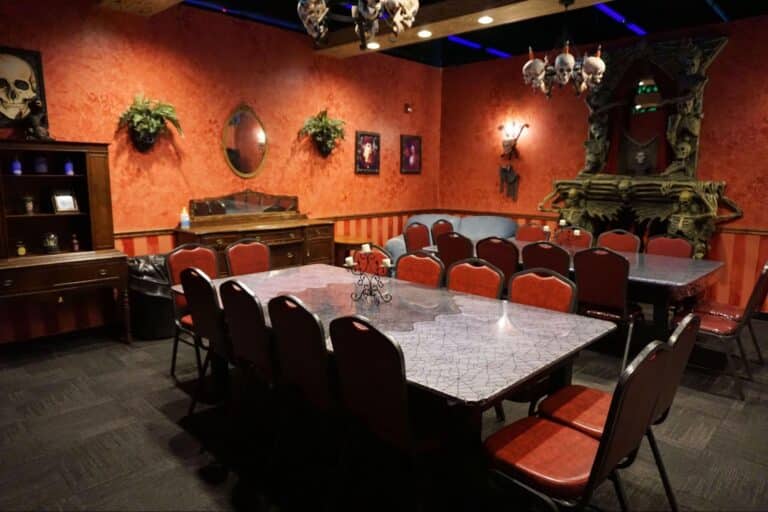 A private Haunted Mansion room set up for a birthday party at a Monster Mini Golf location.