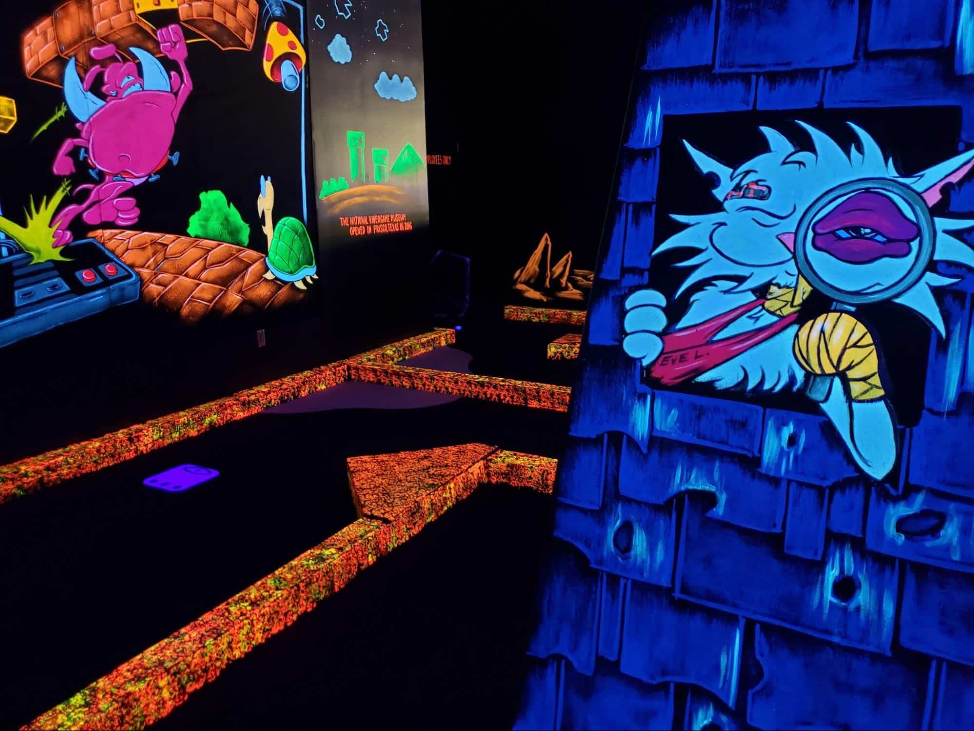 Neon decorations at a Monster Mini Golf indoor golf course location. 