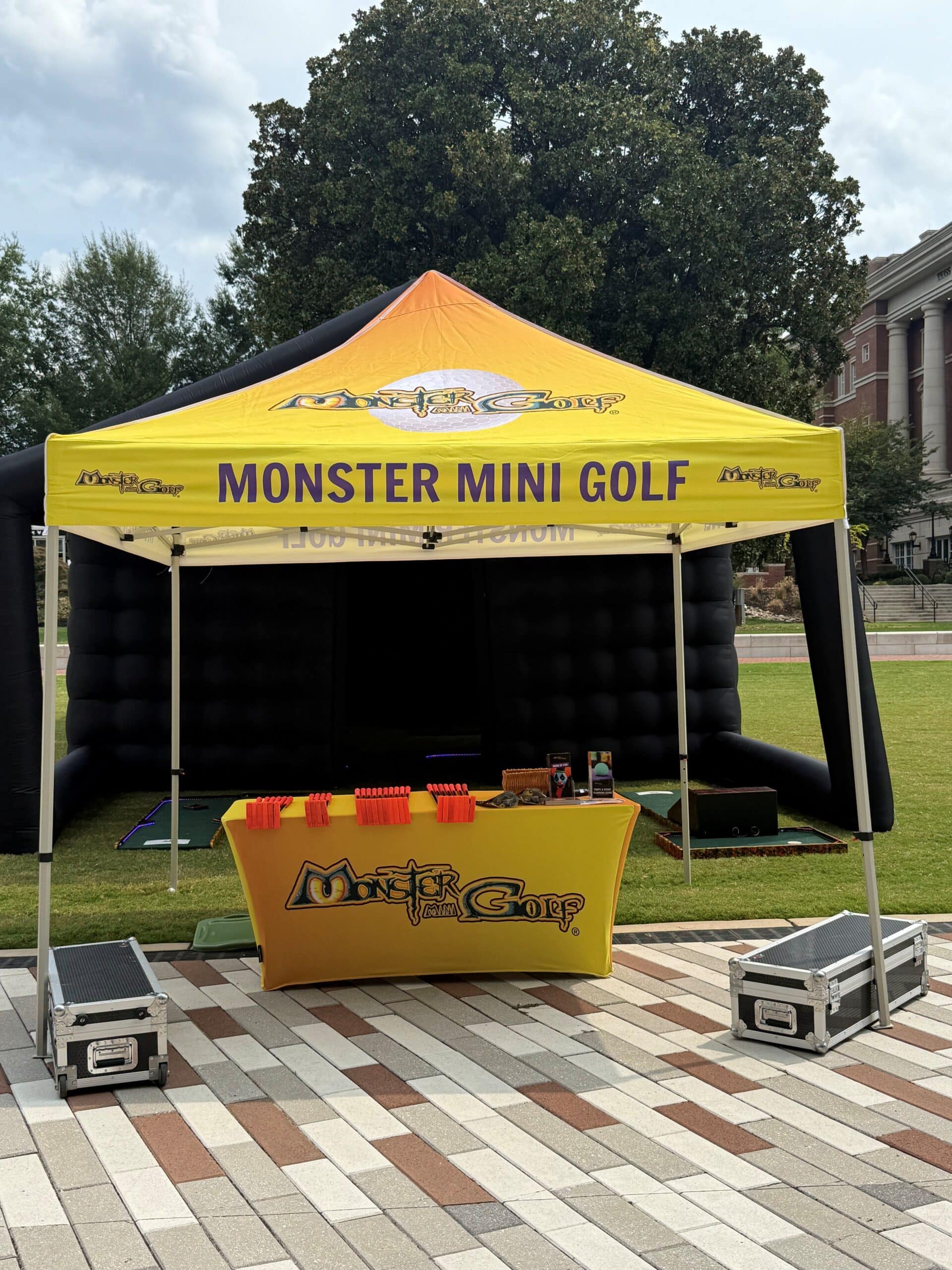 Front ascent game with branded tent and table scaled